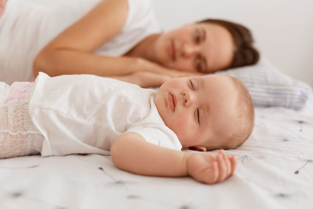 baby rolls onto stomach while sleeping but can't roll back