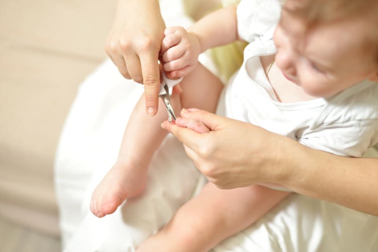 baby scratching head when sleepy - nail trim 