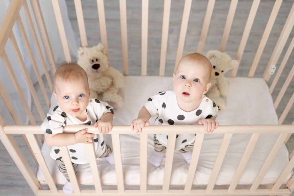 baby standing in crib