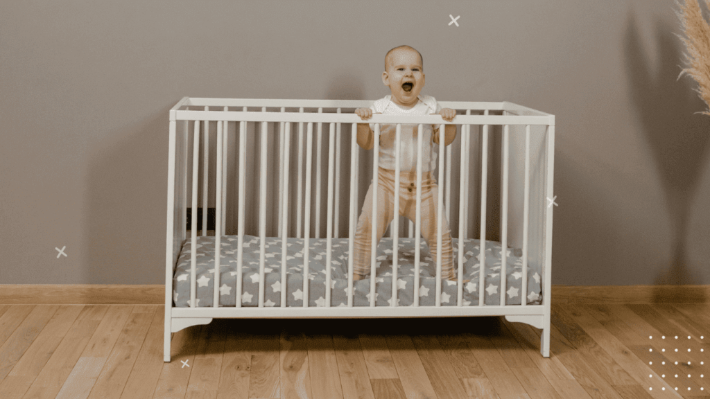 baby standing in crib