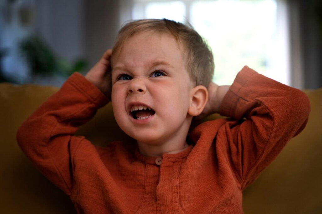 baby grabbing back of head