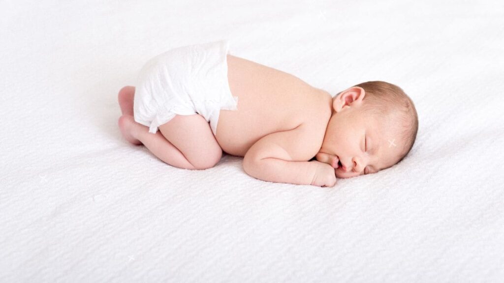 why do babies sleep with their butt in the air