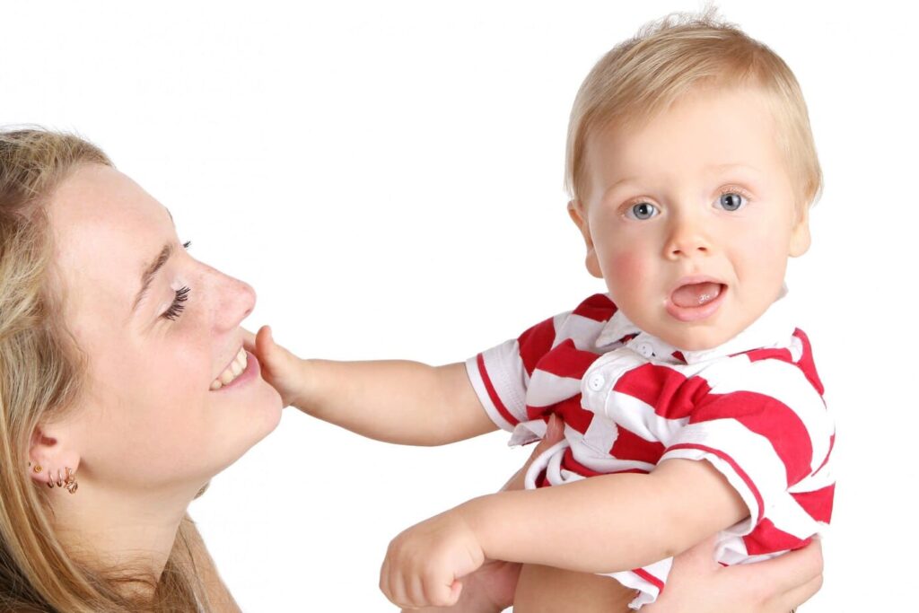 why do babies touch your face