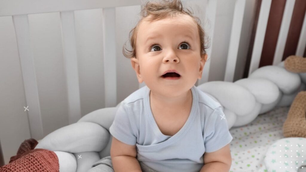 Baby Sitting Up in Crib 7