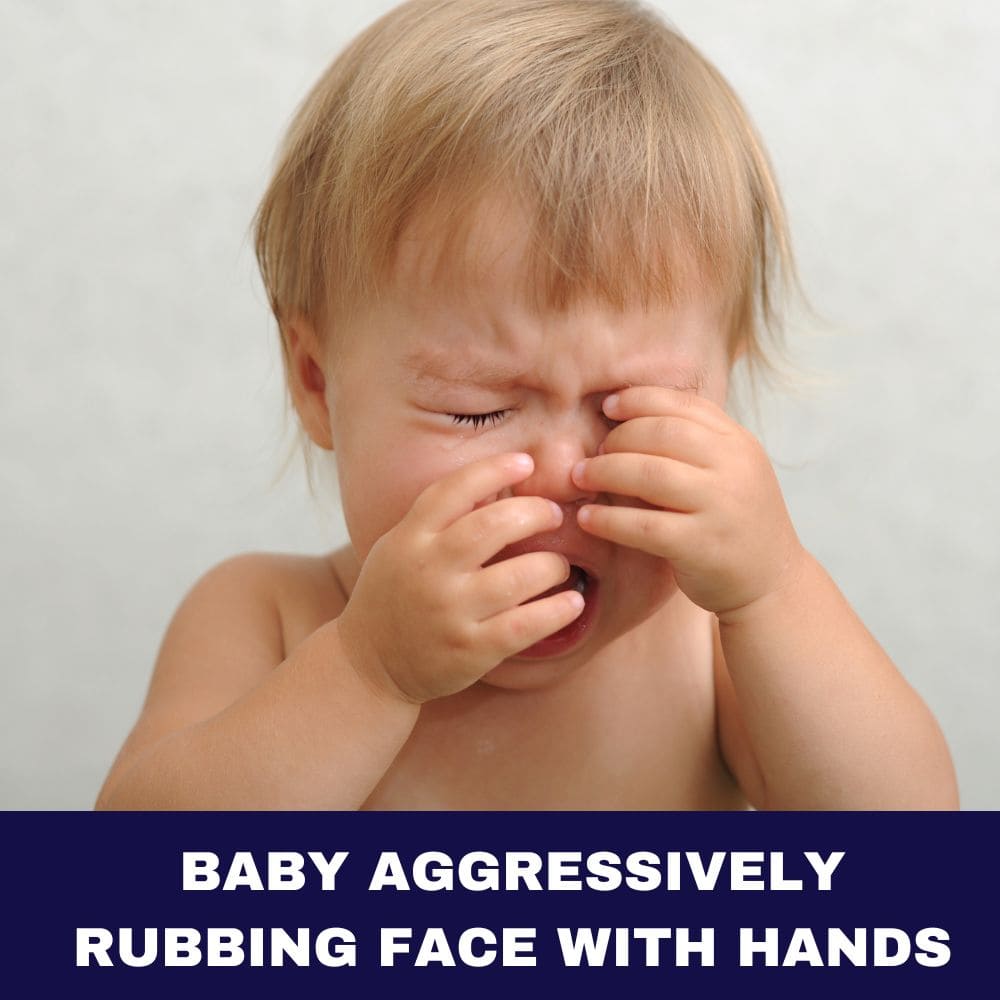 Baby Aggressively Rubbing Face with Hands 2