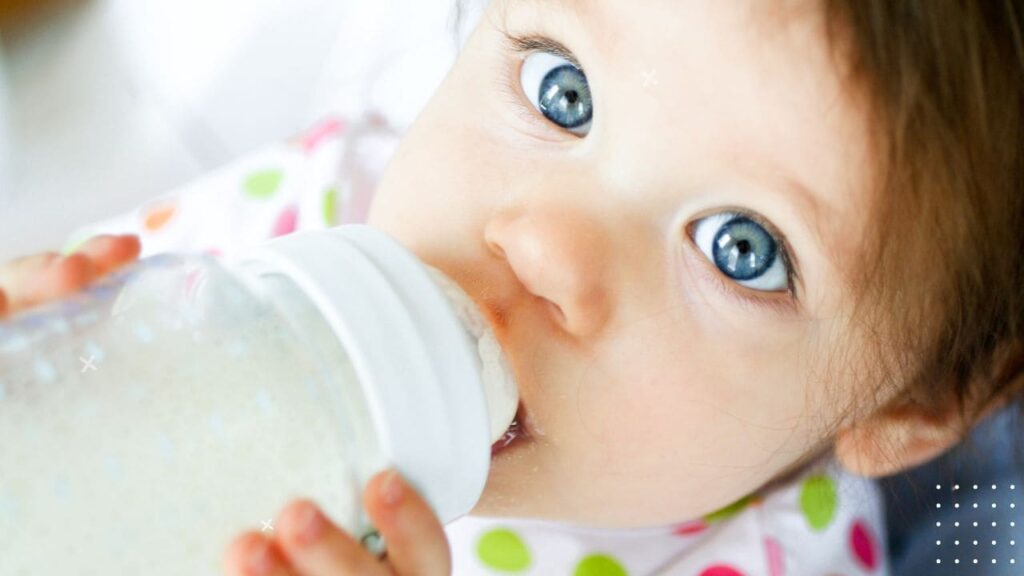 Baby Chewing on Bottle Nipple 4